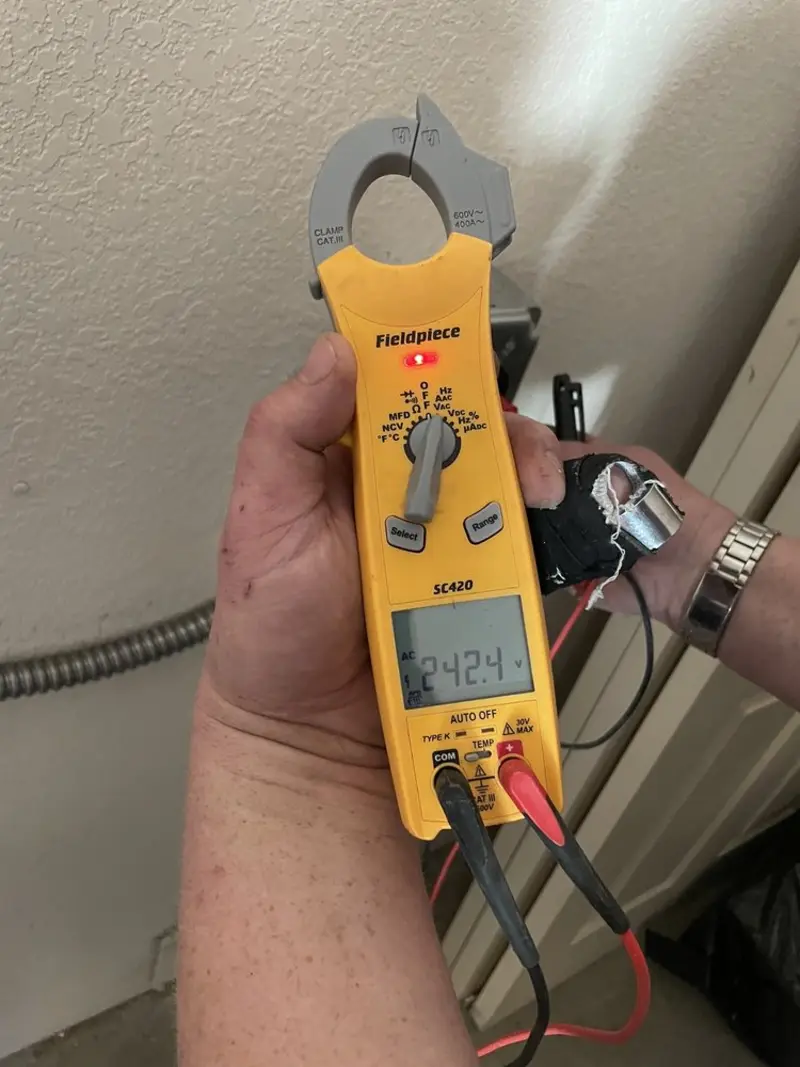Voltage testing with clamp meter during Circuit Breaker Repair in Monmouth
